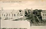  
'Cape-Coast-Castle, Gold-Coast, W.C. Africa.' View of the town (Castle Street) from the Castle wall. Overlooking Anglican Cathedral (left), Methodist Chapel (centre) and Fort William Light House (on hill). Photograph, undated.
Arnold Schlesinger, Hamburg.