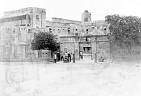  
Code: 0002 4065
Category: Views of Cape Coast

4. Cape Coast Castle, main gate and clock tower

It is likely that Hendrik Muller visited Cape Coast after he visited Elmina. Cape Coast is the former British Capital of the Gold Coast, situated circa 15 kilometres east of Elmina. All photo's of Cape Coast show views of the town and were most likely bought by him.

Cape Coast Castle was headquarters of the British government in the Gold Coast from 1652 to 1875. In the latter year, the seat of government was transferred to Accra (still the capital of Ghana) and the castle lost its function. On the photo, the building is in a bad state of maintenance, showing from the complete lack of whitewash on the walls. Today the castle is a museum and the regional offices of the Ghana Museums and Monument Board.
